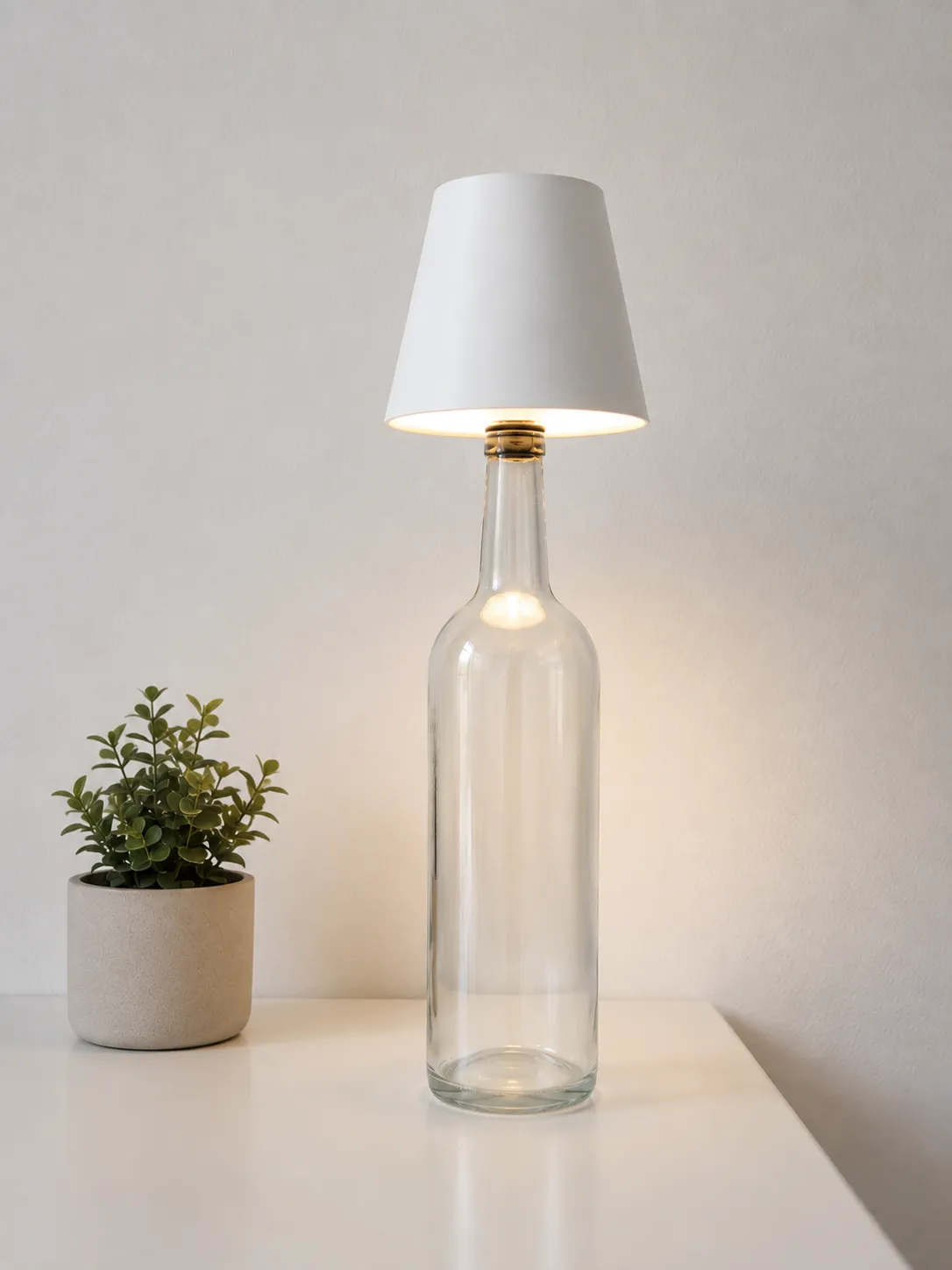 GlowVine bottle lamp casting warm amber light